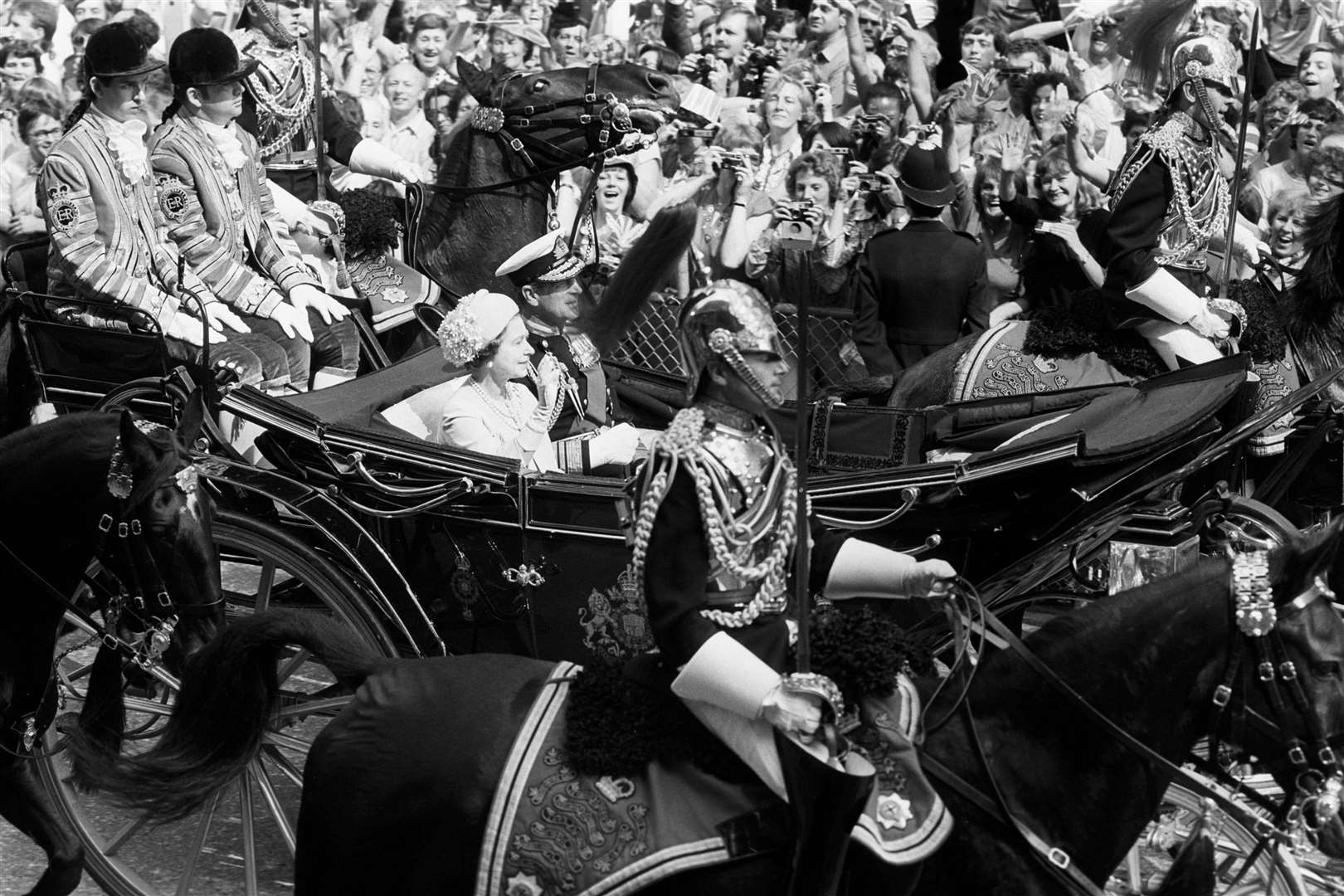 Paul Whybrew (far left) with the Queen and the Duke of Edinburgh driving down Fleet Street for the Prince of Wales and Lady Diana Spencer’s royal wedding in 1981 (PA)