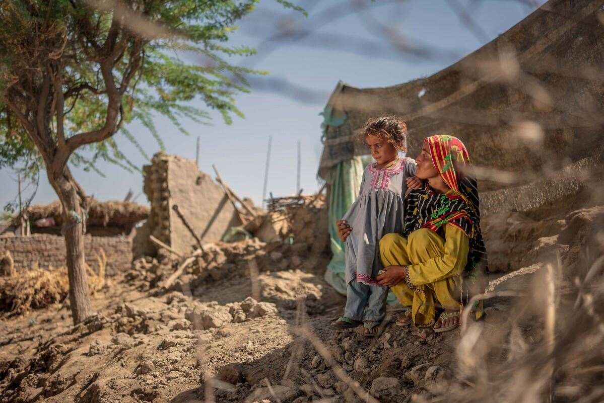 Maryam and her young daughter Zainab lost their homes to the floods and had to sleep under trees with no light, shelter, or clean drinking water (ShelterBox/PA)