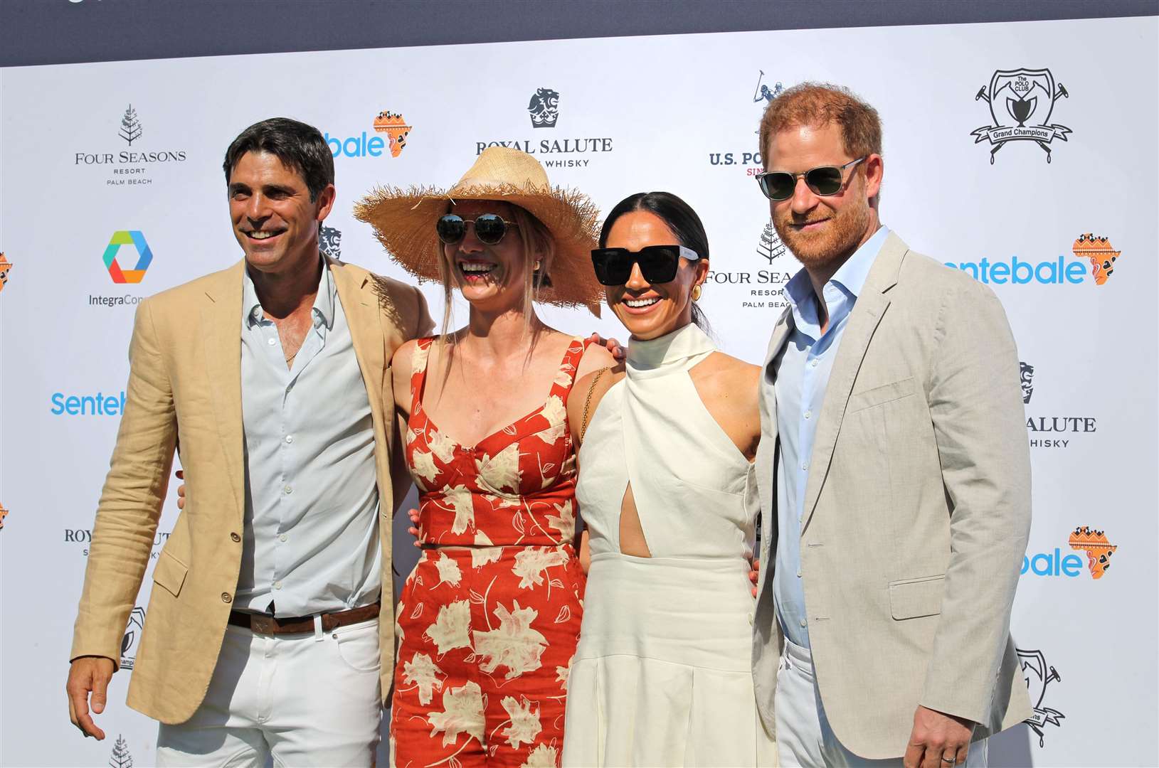The Duke and Duchess of Sussex (right) with Nacho Figueras and his wife Delfina Blaquier (left) during the Royal Salute Polo Challenge (Yaroslav Sabitov/PA)