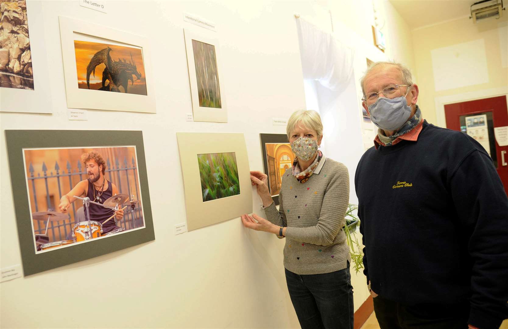 Camera Club snappers Rhona Cameron and Ian McLennan showing off some of the pictures on display.