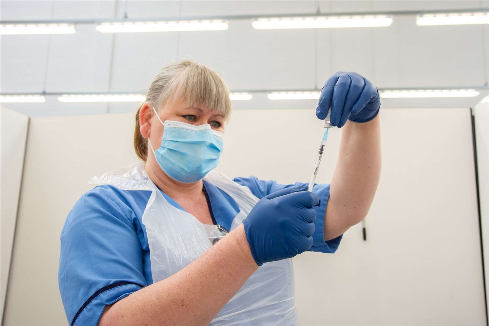 Ailsa Davidson reloads the vaccine...The vaccine rollout in Moray has been increased due to the rising cases of COVID19 in the area...Picture: Daniel Forsyth..