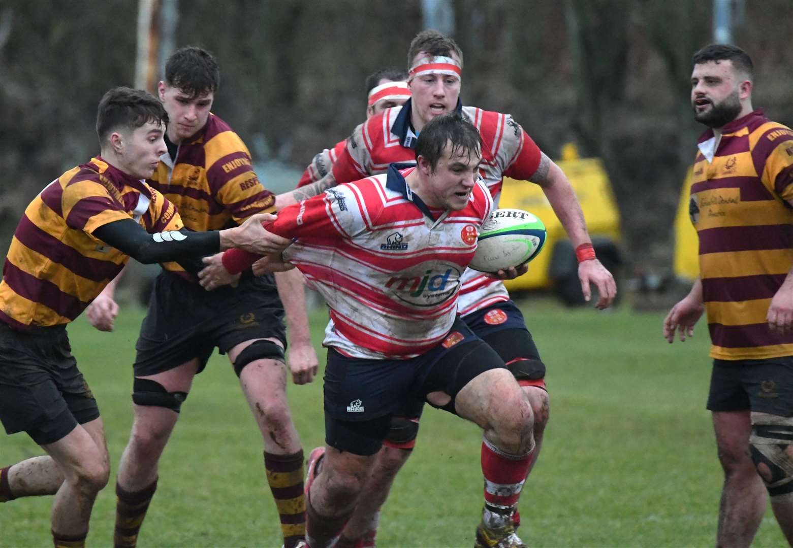Cameron Hughes tries to break tackle. Picture: James Officer
