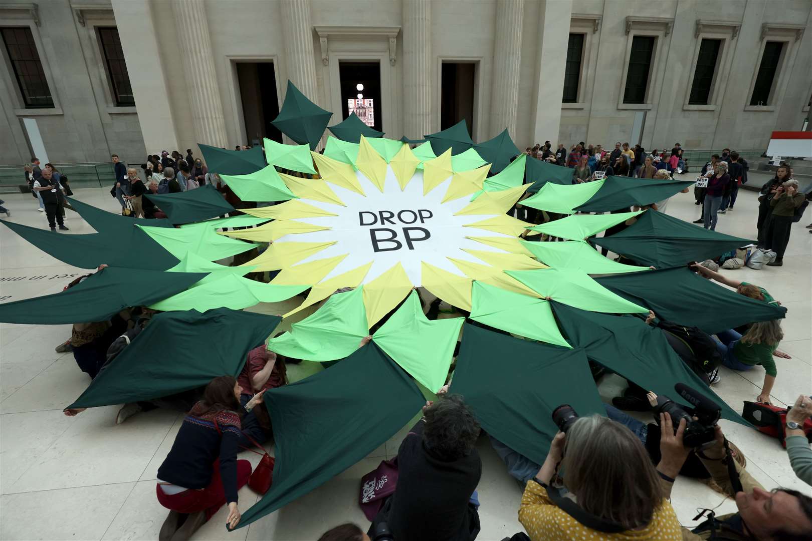 A ‘Drop BP’ sign is displayed at the British Museum in central London during a protest by Extinction Rebellion protesters over the museums sponsorship deal with BP in 2022 (James Manning/PA)