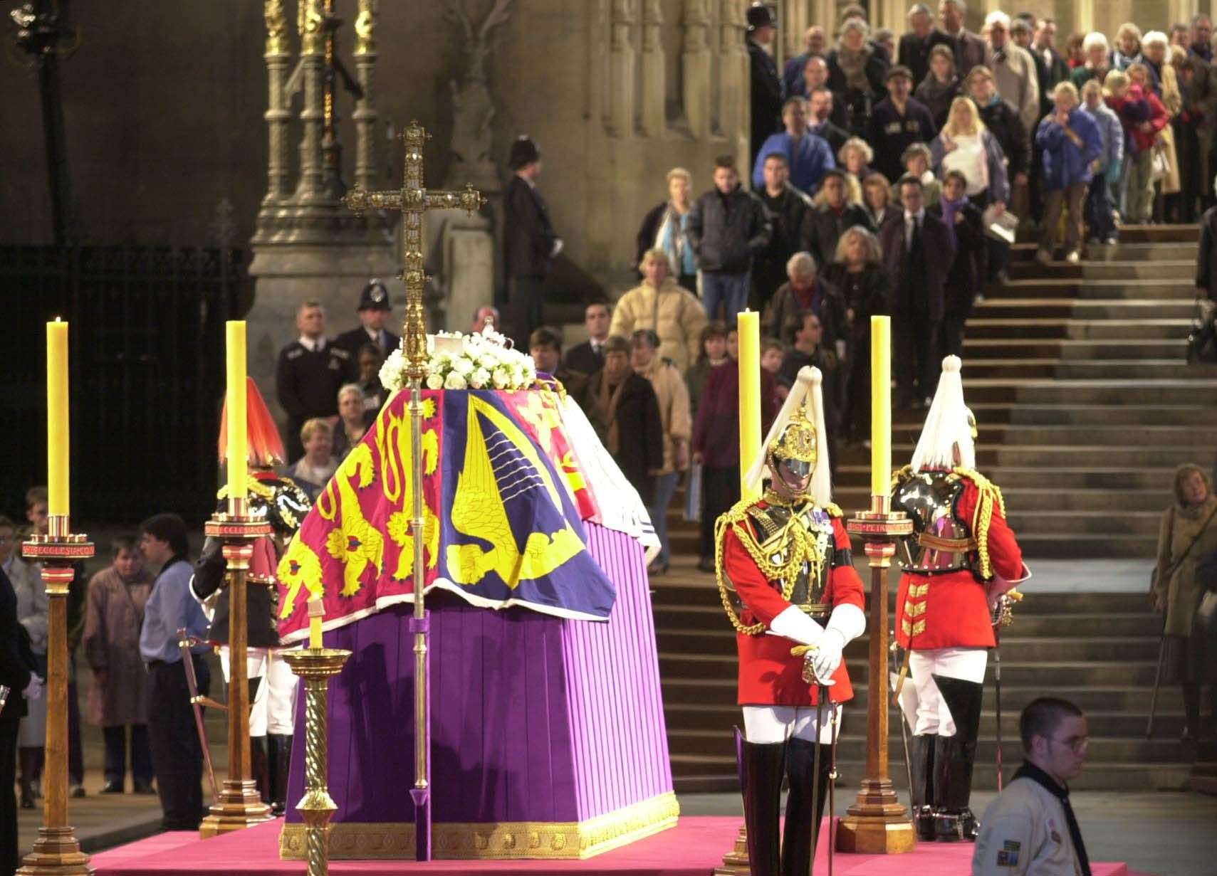 People filing past the coffin of Queen Elizabeth The Queen Mother, in Westminster Hall in 2002 (PA)