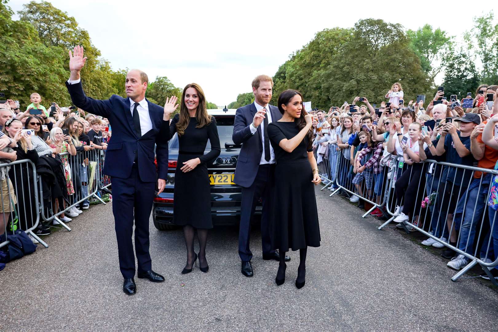 The Prince and Princess of Wales and the Duke and Duchess of Sussex wave to members of the public (Chris Jackson/PA)
