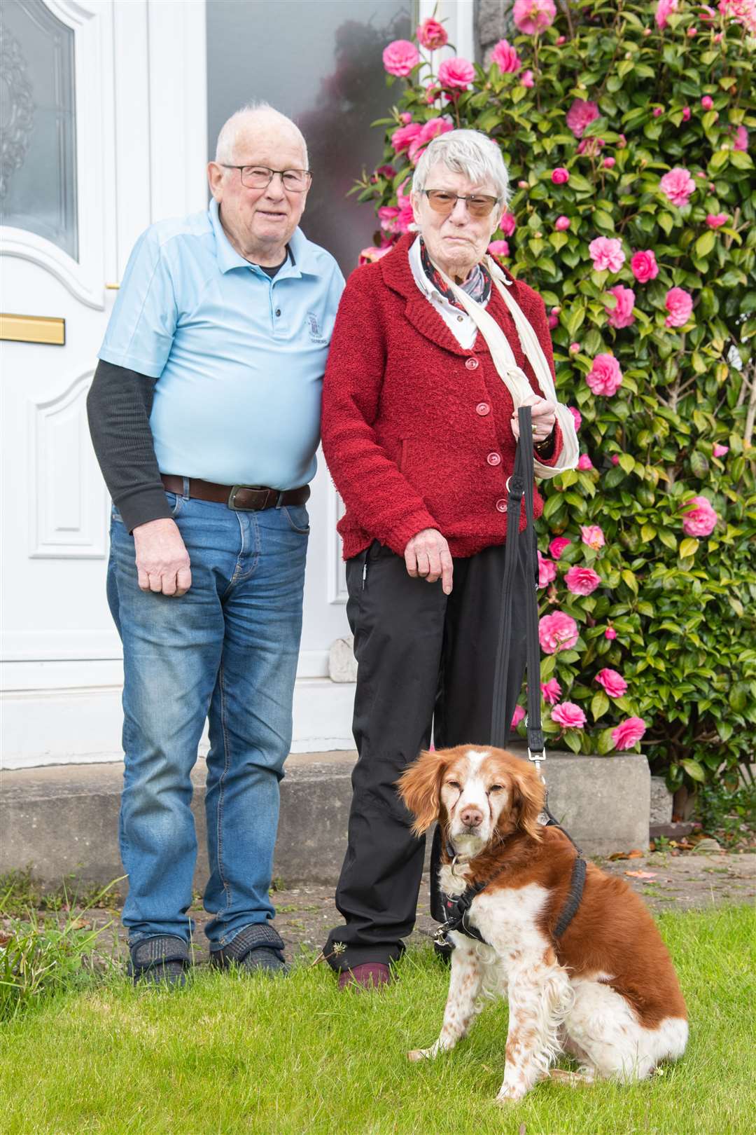 Dorothy and her husband Alex with their dog Perry. Picture: Daniel Forsyth