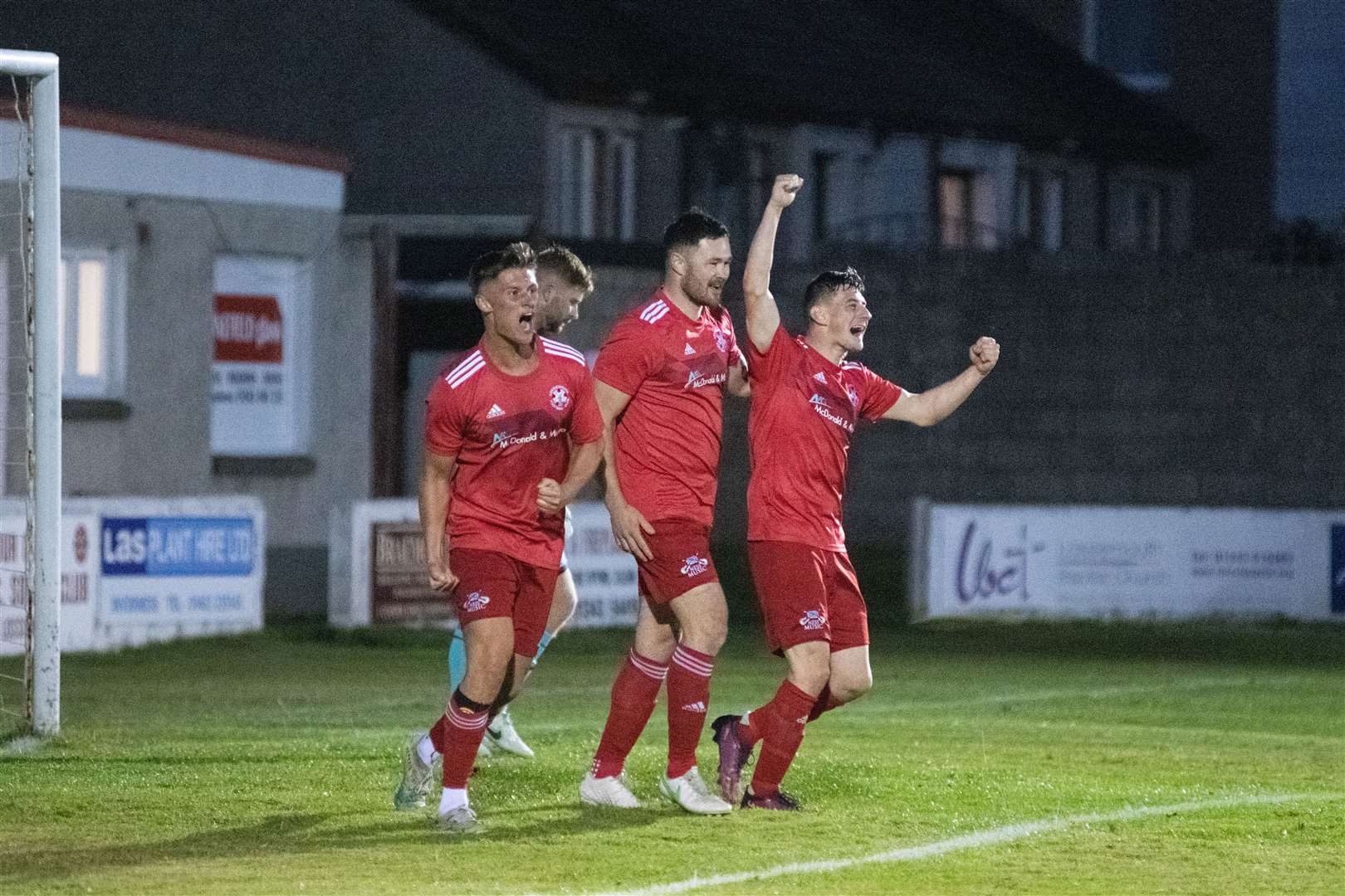 Ross Archibald (right) was on target for Lossiemouth. Picture: Daniel Forsyth..