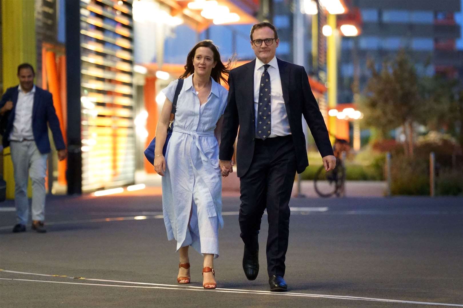 Tom Tugendhat leaving with his wife, Anissia, following the first TV leadership debate (Victoria Jones/PA)