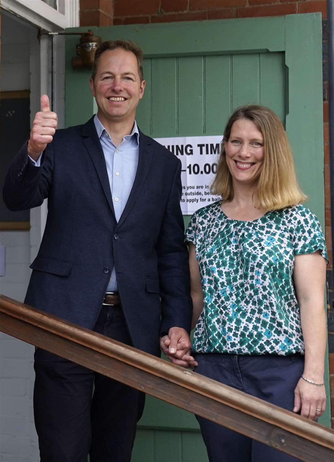 The Liberal Democrats’ by-election candidate Richard Foord (left) poses for a photograph with his wife Kate after they cast their votes (Andrew Matthews/PA)
