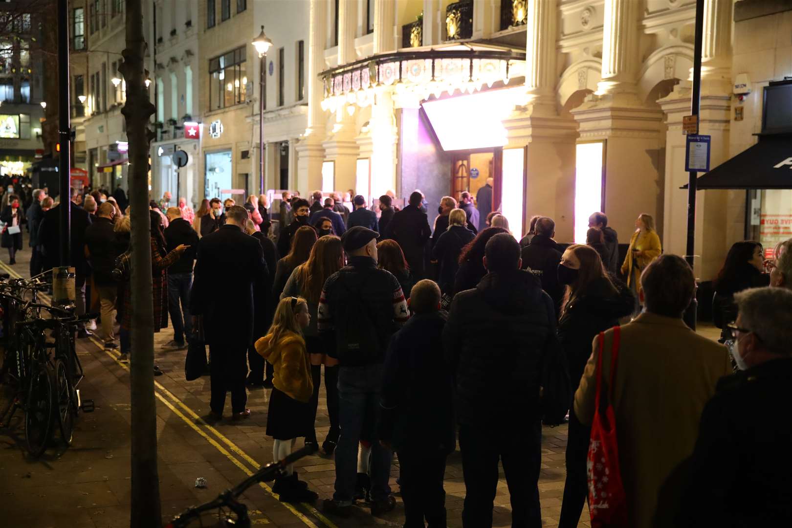 Large queues outside the London Palladium before the capital moved into the highest tier of coronavirus restrictions (Aaron Chown/PA)