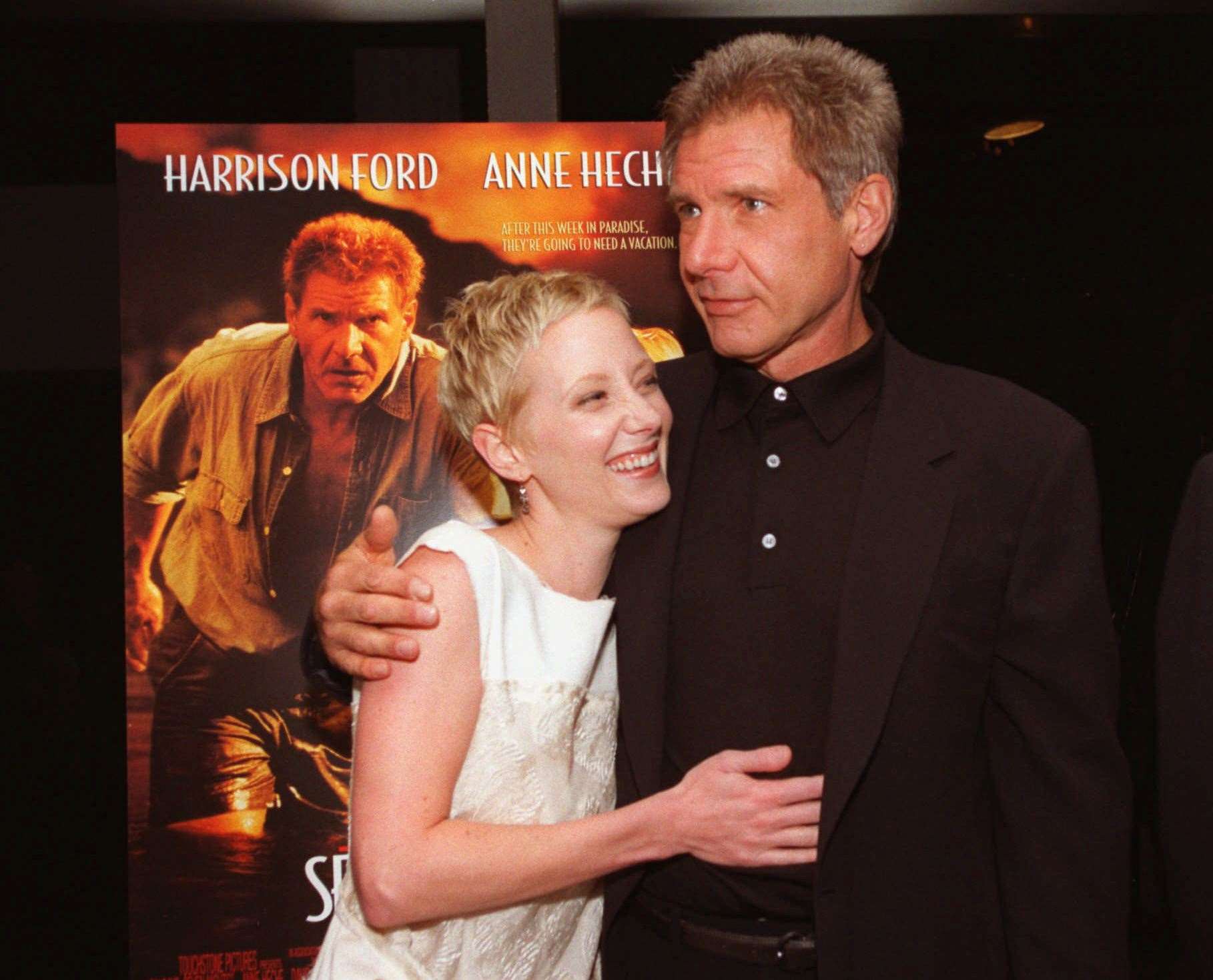 Anne Heche and Harrison Ford embrace at the premiere of their film, Six Days, Seven Nights in 1998 (Chris Pizzello/AP)