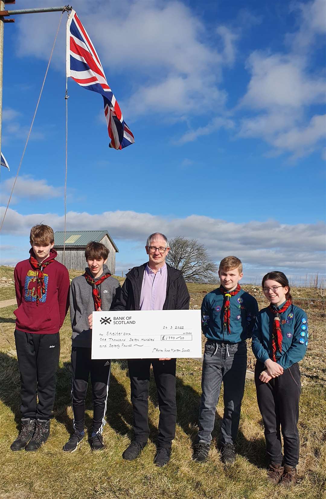 Adam Rhind, Jack Kendrick, Harry Elvines and Phoebe Dennis with Forres Rotary president Tony O’Neill at Aitnoch off the A939.