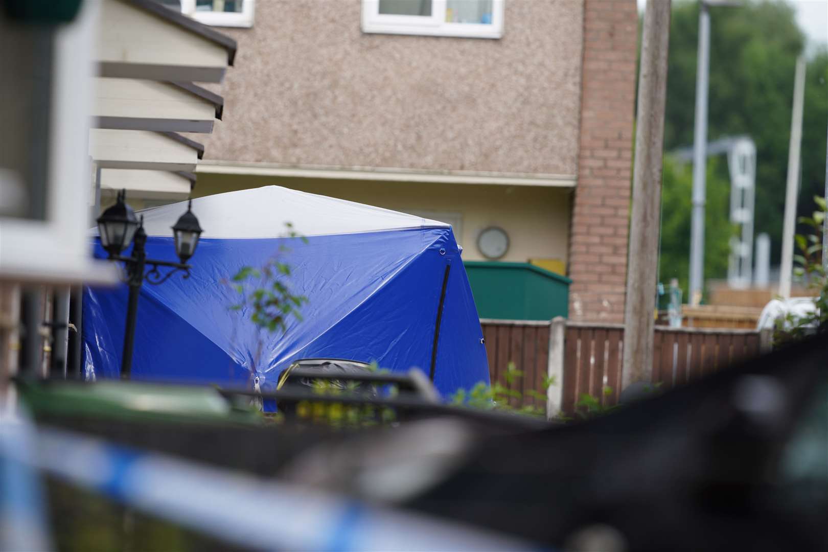 A police tent has been erected at the scene in Bednal Avenue, Miles Platting (Peter Byrne/PA)