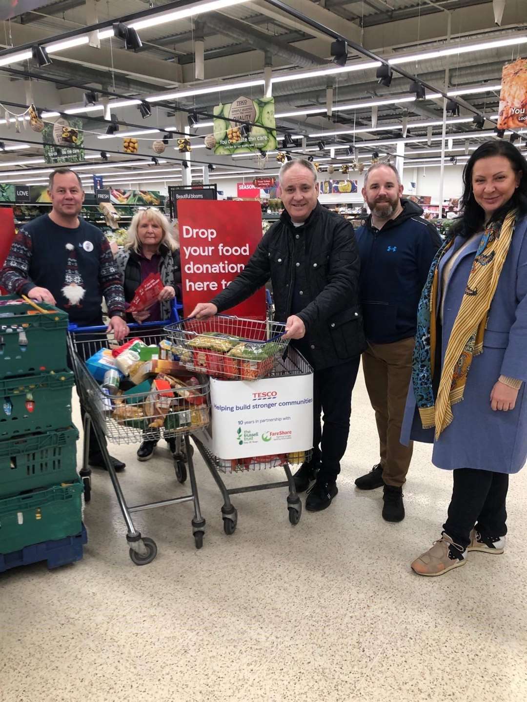 Andy Stewart, Store Manager, Cllr Scott Lawrence, Val and Hanna (volunteers at Moray Food Plus) with Richard Lochhead (centre).