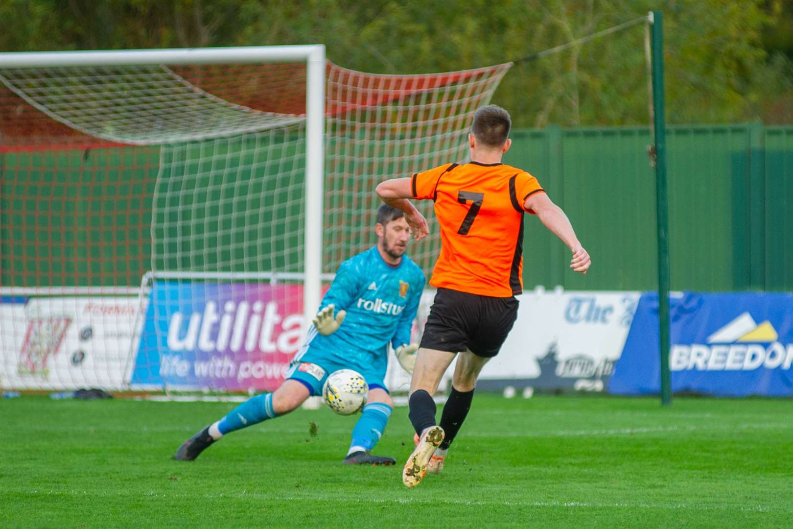 Craig Cormack scores the Rothes winner past Formartine keeper Kevin Main .Picture: Daniel Forsyth..