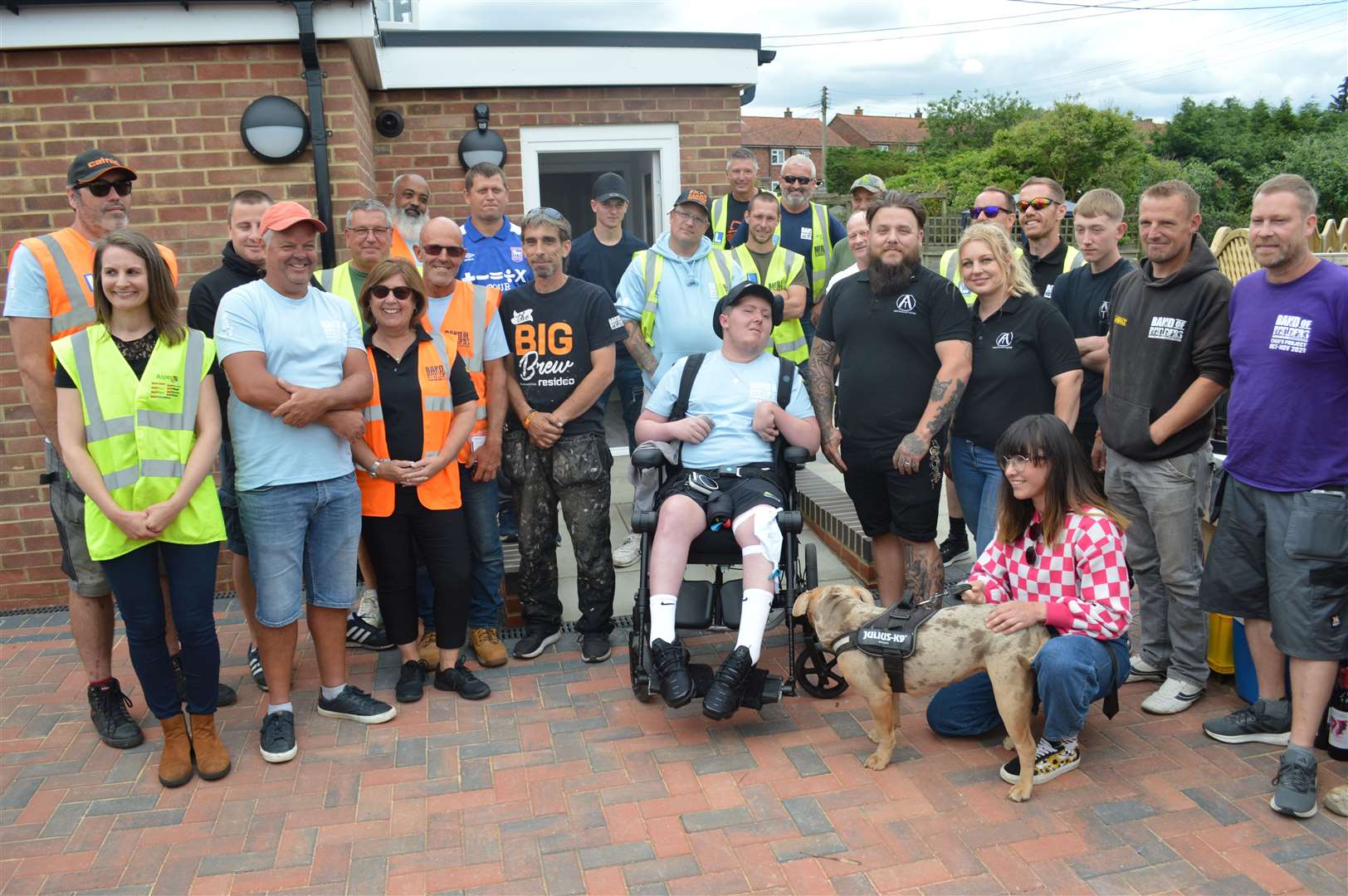 Luke with some of the team who helped with the extension (Band of Builders/PA)
