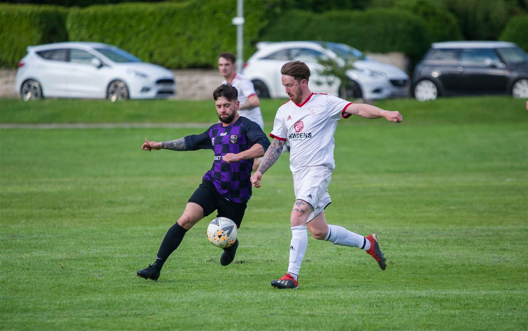 Jordan Robertson (L) and Scott Moore...Mosset Tavern v Carisbrooke in the Forres and Nairn District Welfare League. Picture: Becky Saunderson