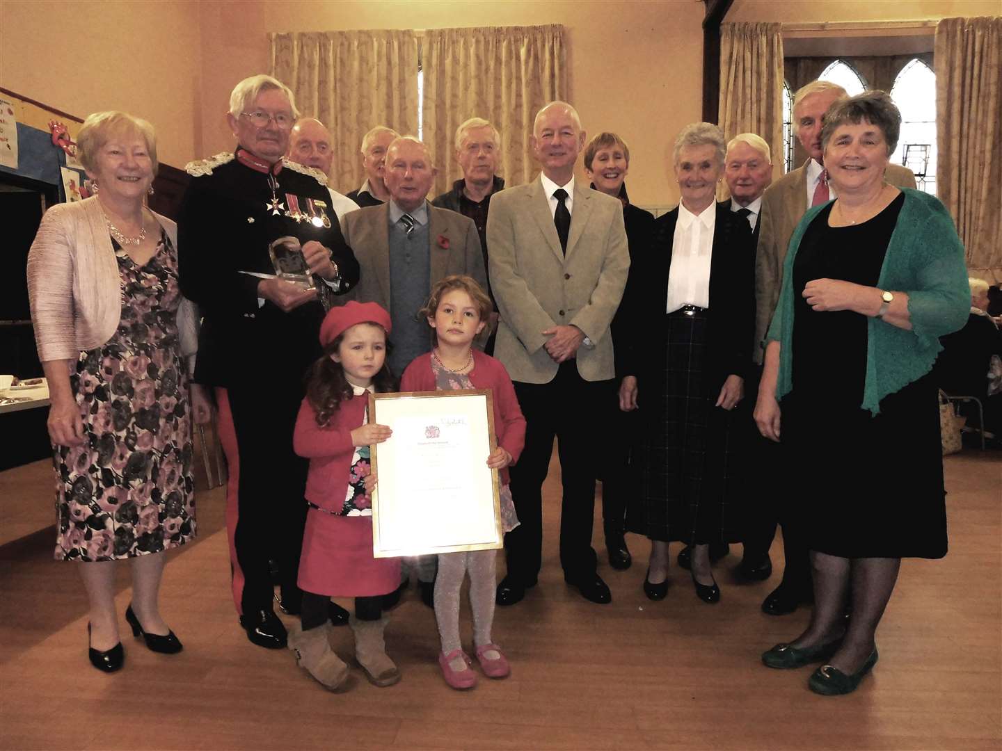 Forres In Bloom representatives with the Lord Lieutenant and their award.