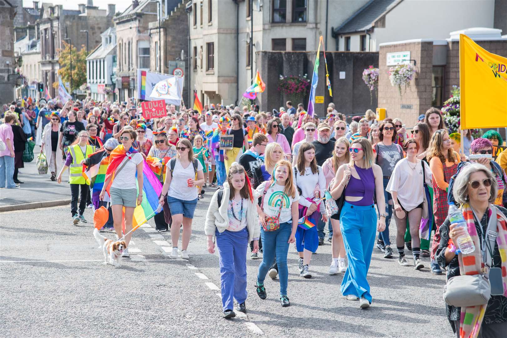 Passing Forres House Community Centre during the procession to Grant Park. Picture: Daniel Forsyth