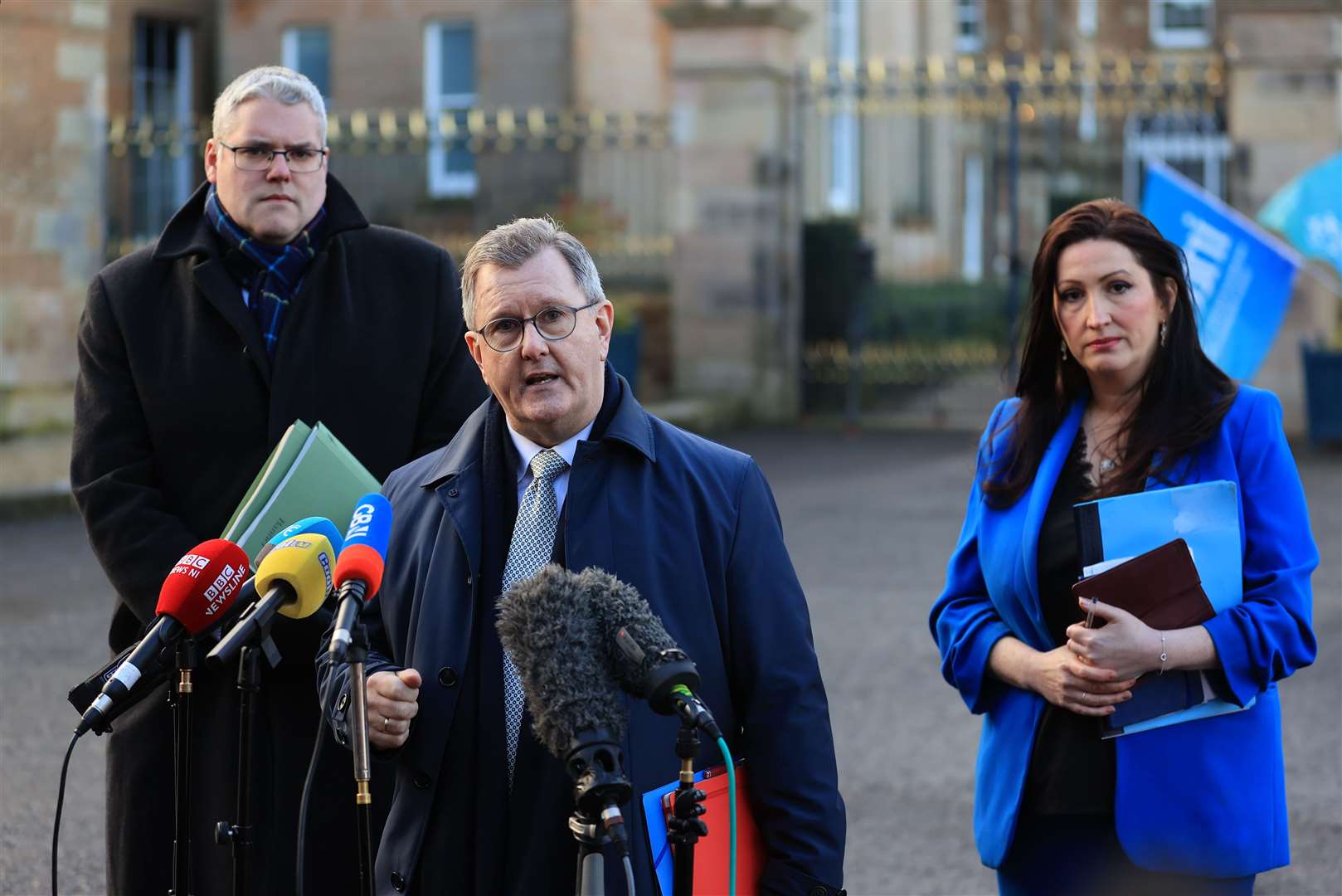 DUP leader Sir Jeffrey Donaldson, centre, with fellow party officers Emma Little-Pengelly and deputy leader Gavin Robinson (PA)