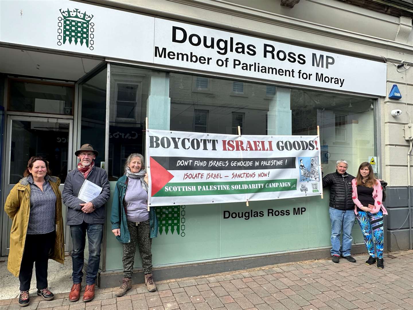 Members of the group held a demonstration outside Mr Ross' office on Friday. Picture: David Christie