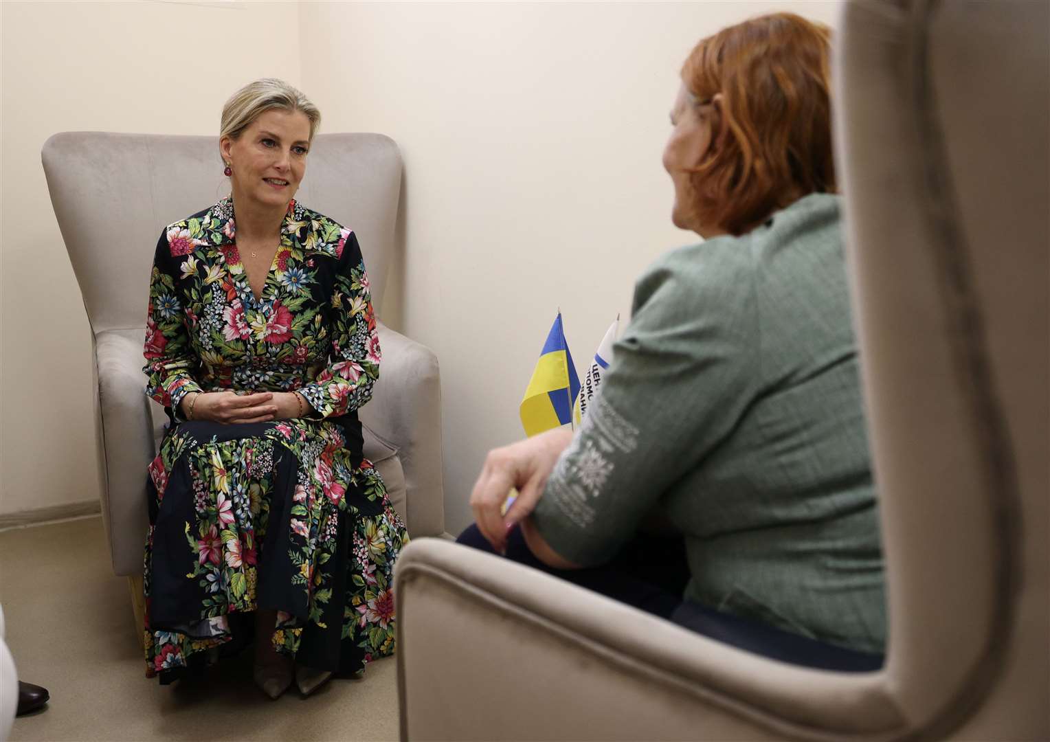 The Duchess of Edinburgh talks to a woman affected by the war (Anatolii Stepanov/PA)