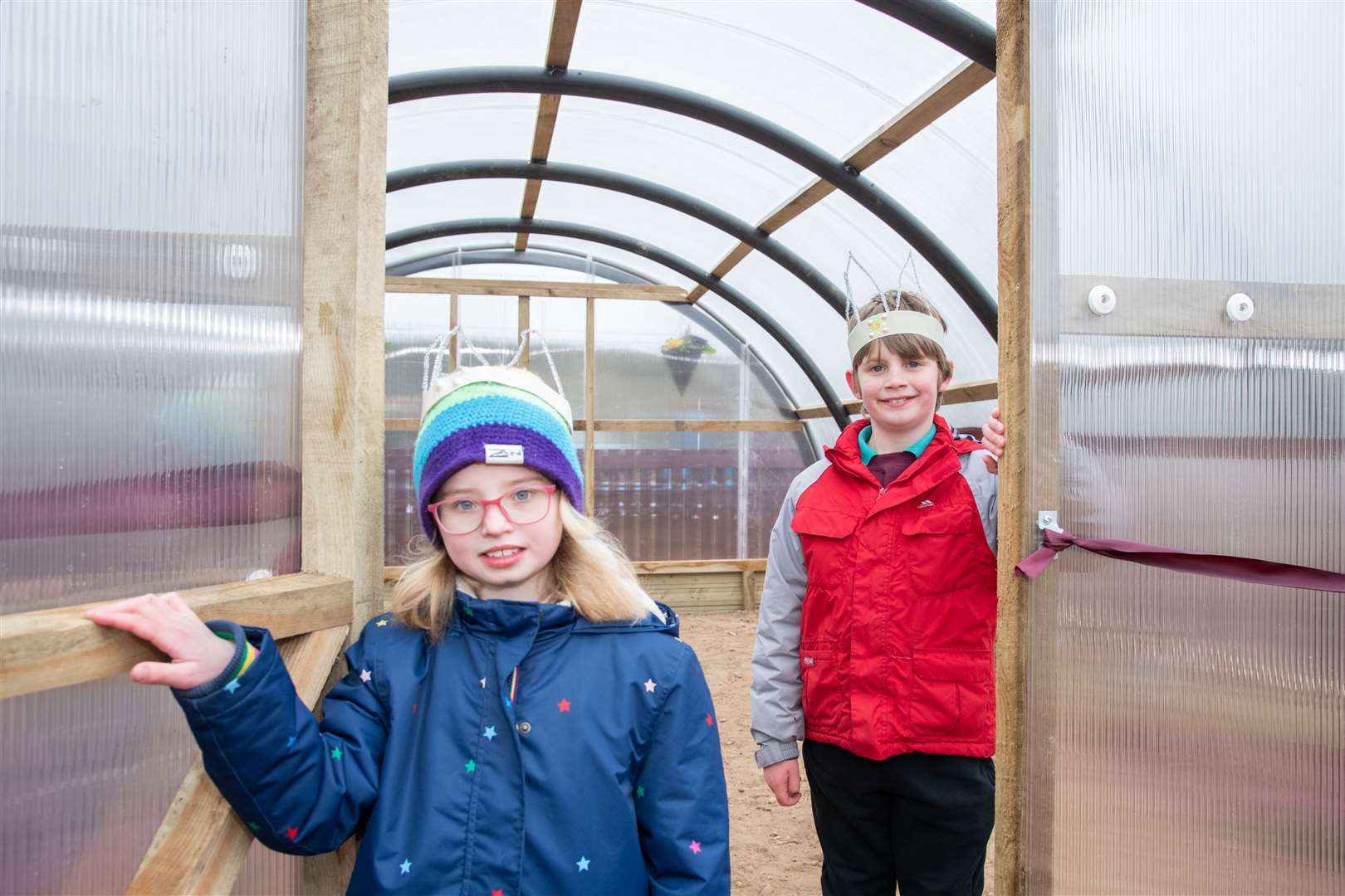 Dallas pupils Aila Gibson and Sammy Edwards in the new polycrub. Picture: Daniel Forsyth
