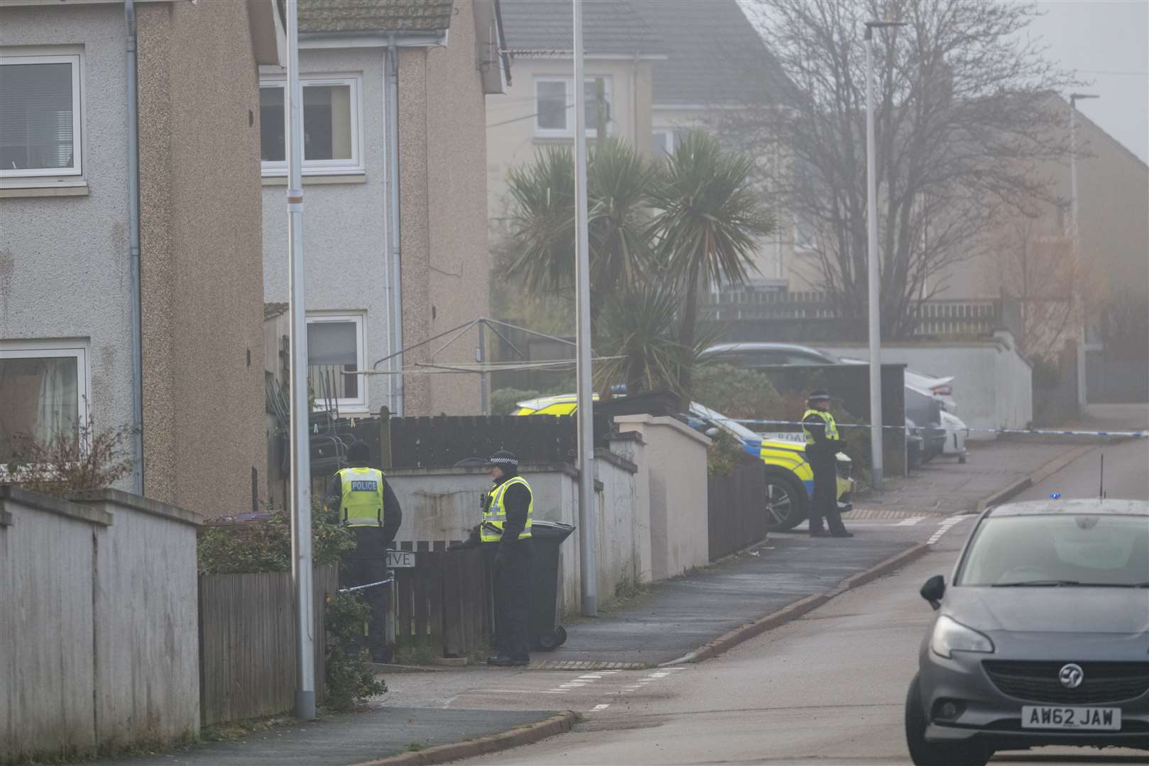 Officers at the scene of the murder investigation in Elgin. Picture: Jasperimage