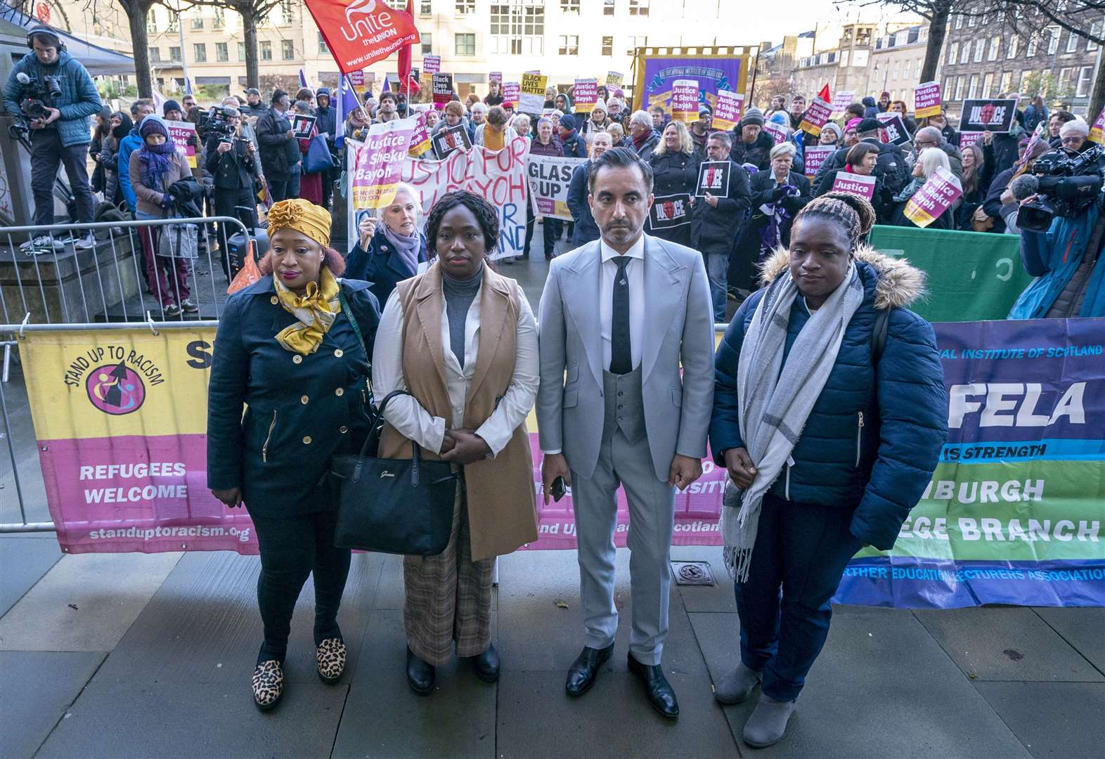 The sisters of Sheku Bayoh with their lawyer at a previous hearing (Jane Barlow/PA)